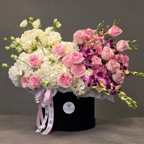 luxury pink orchid and rose flower box in BLOOMSI signature black velvet box Toronto