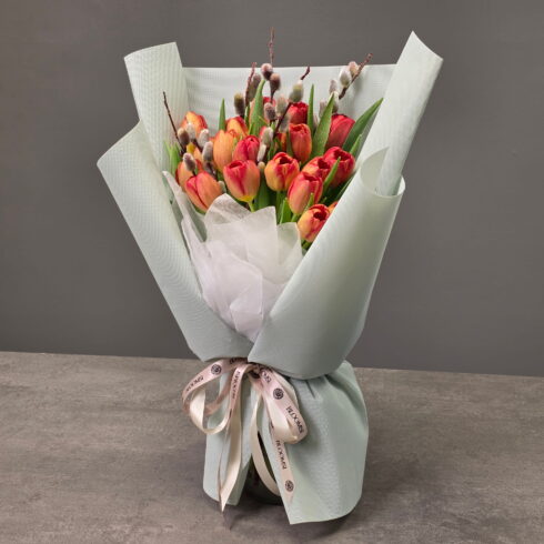 Orange tulips with pussy willow bouquet in elegant mint wrap by BLOOMSI, Oakville Toronto GTA