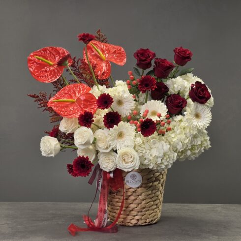 Luxury flower basket with anthurium, hydrangea, roses and gerbera in woven basket by BLOOMSI