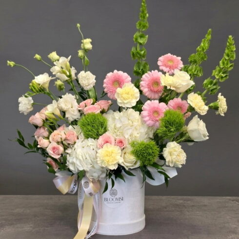luxury pastel flower arrangement in BLOOMSI hat box Oakville Mississauga